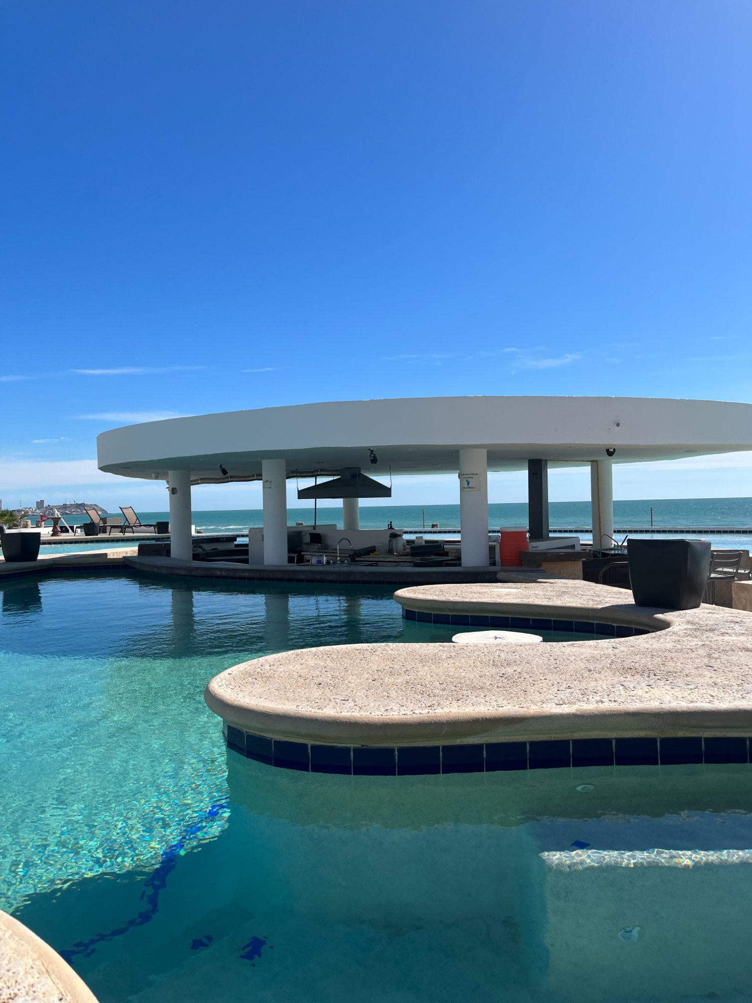 Las Palmas swim-up bar infinity pool with ocean view